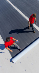 men installing epdm
